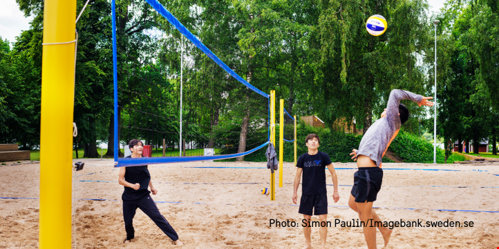 Kids playing beach volley